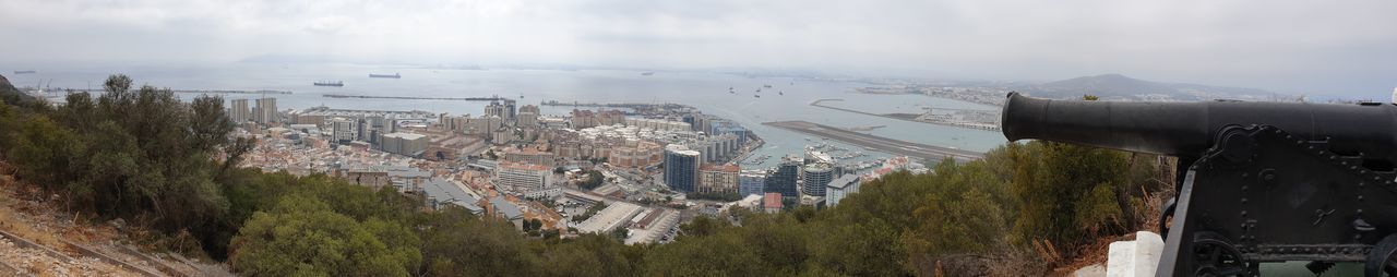 High angle view of buildings in city against sky