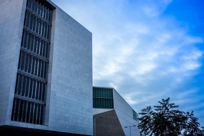 Low angle view of modern building against sky