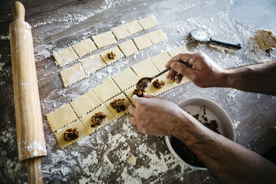 High angle view of person preparing food