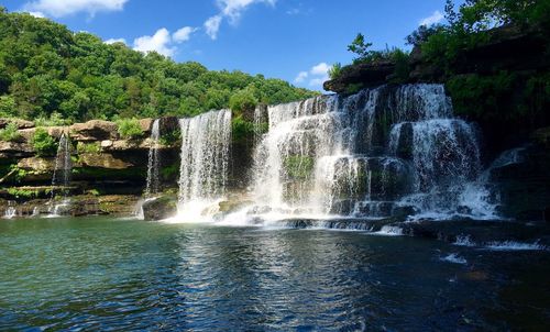 Scenic view of water flowing through rocks