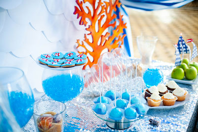 Close-up of multi colored candies on table