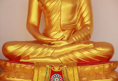 Close-up of yellow statue