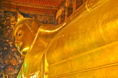 Statue of buddha outside building