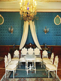 Chairs and table at entrance of temple