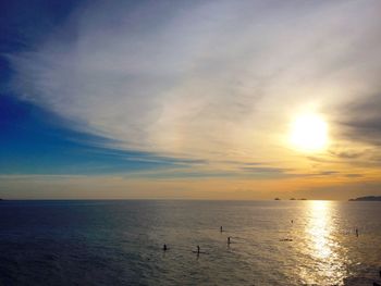 Scenic view of sea at sunset