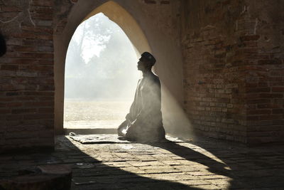 Muslim men praying in an old mosque in phra nakhon si ayutthaya province. person