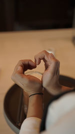 Cropped hand of woman with nail polish