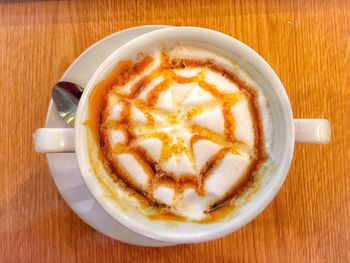 Close-up of cappuccino on table