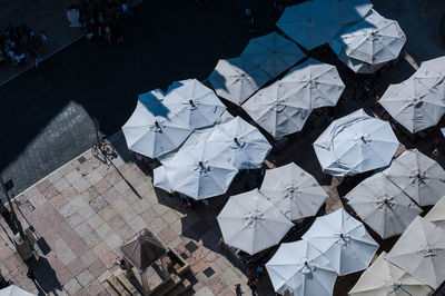 High angle view of paper hanging from tree