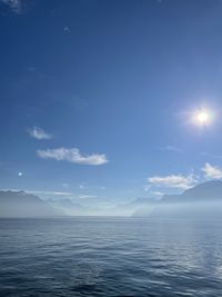 Scenic view of sea against blue sky