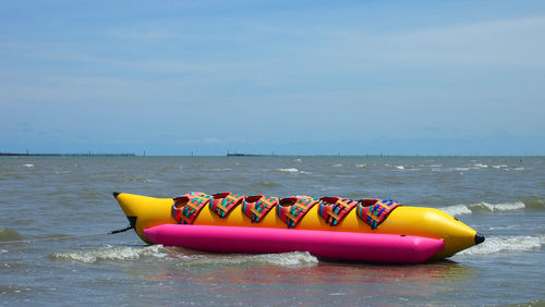 Boat in sea against sky