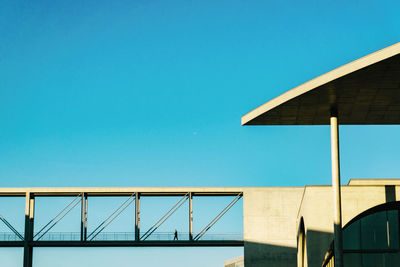 Low angle view of building against clear blue sky