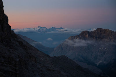 Scenic view of mountains against sky during sunset