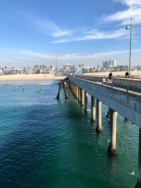 Scenic view of sea against blue sky