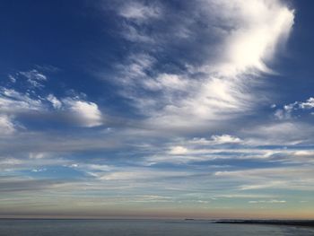 Scenic view of sea against dramatic sky