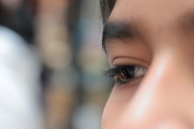 Close-up of woman looking away