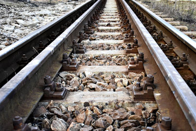 Railroad track amidst rocks