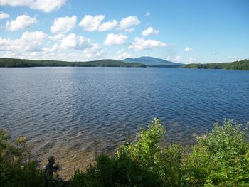 View of lake against cloudy sky