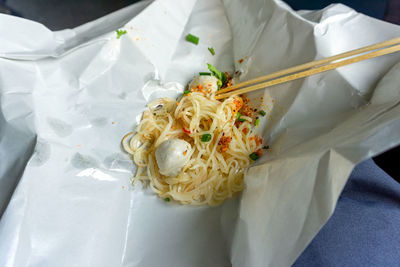 High angle view of pasta in plate on table