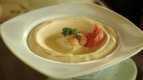 Close-up of hummus served in plate