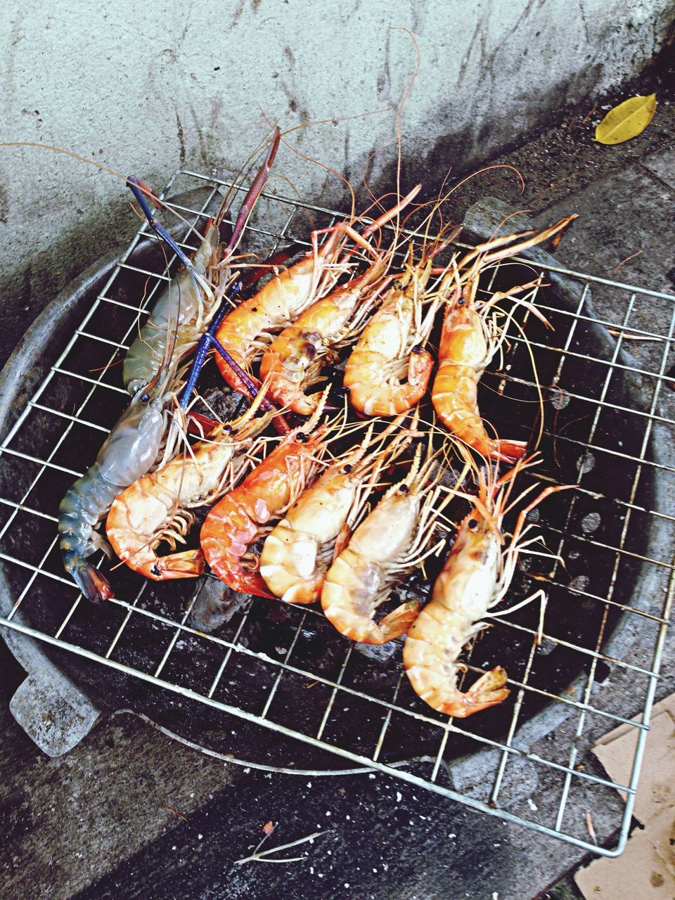 food, barbecue grill, food and drink, heat - temperature, grilled, meat, barbecue, preparation, cooking, preparing food, freshness, indoors, fire - natural phenomenon, roasted, high angle view, seafood, flame, grill, healthy eating, close-up