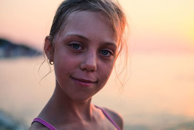 Close-up portrait of smiling girl