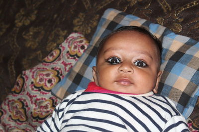 Portrait of cute baby girl at home