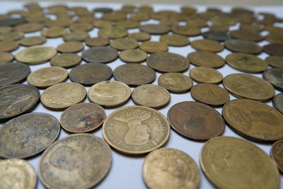 High angle view of coins on table
