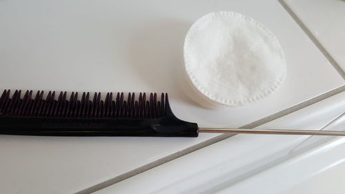 High angle view of comb on table