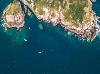 High angle view of rock formation in sea