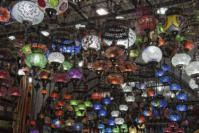 Low angle view of lanterns hanging in store