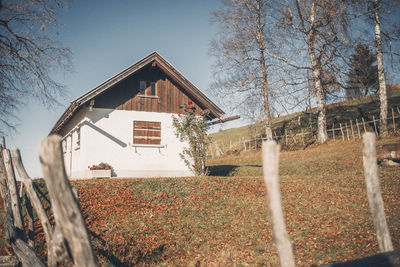 House on field against sky