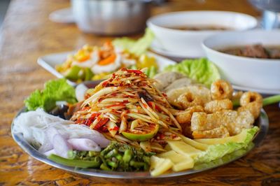 Close-up of food served on table