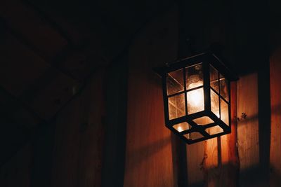 Close-up of lamp on wall