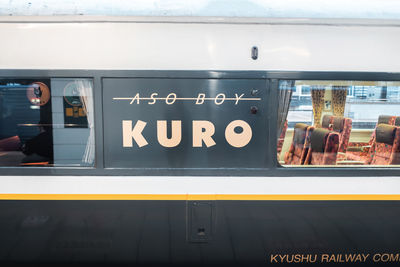 Text on railroad station platform