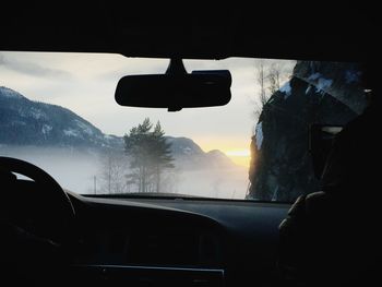 Sunset seen through train windshield