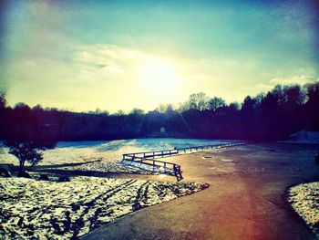 Scenic view of lake at sunset