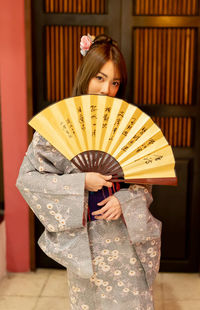 Woman holding umbrella