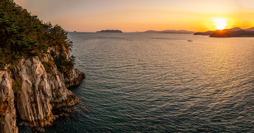 Scenic view of sea against sky during sunset