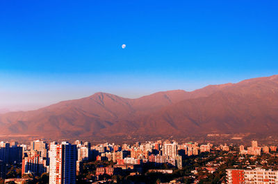 Cityscape against blue sky