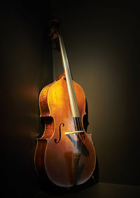 Close-up of guitar on table