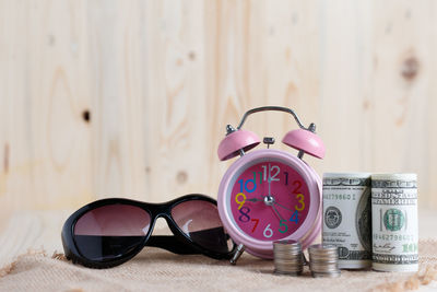 Close-up of clock on table