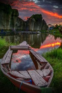 Scenic view of lake against sky during sunset