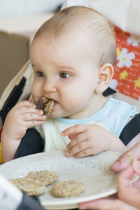 Portrait of cute baby at home