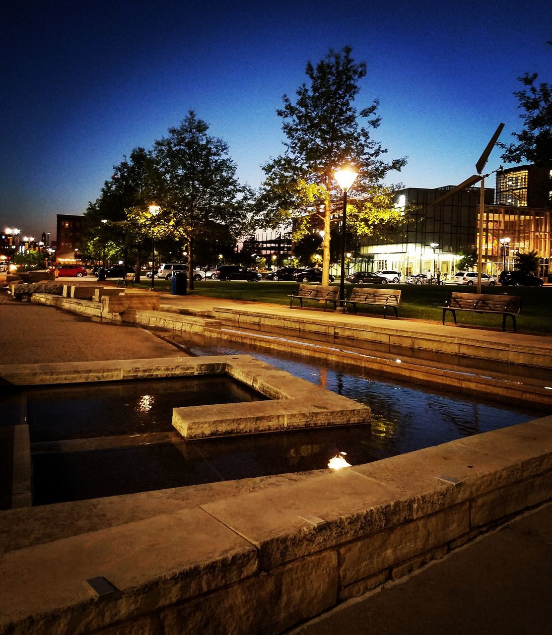 illuminated, night, built structure, street light, tree, architecture, building exterior, outdoors, clear sky, no people, water, sky, nature