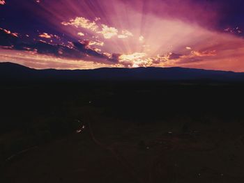 Scenic view of silhouette mountain against sky during sunset