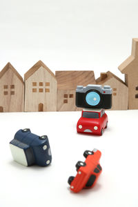 Close-up of toy car on table against white background
