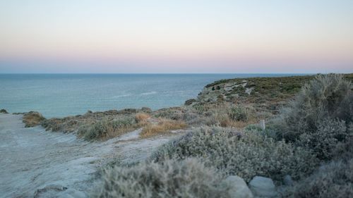 Scenic view of sea against clear sky