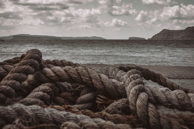 Close-up of rope tied on shore