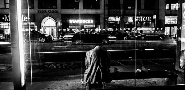 People on street in city at night